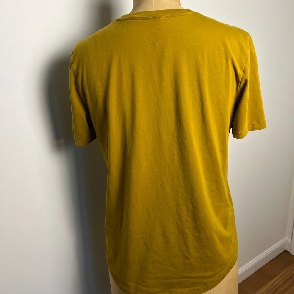 Lululemon mustard color short sleeve t-shirt size 6